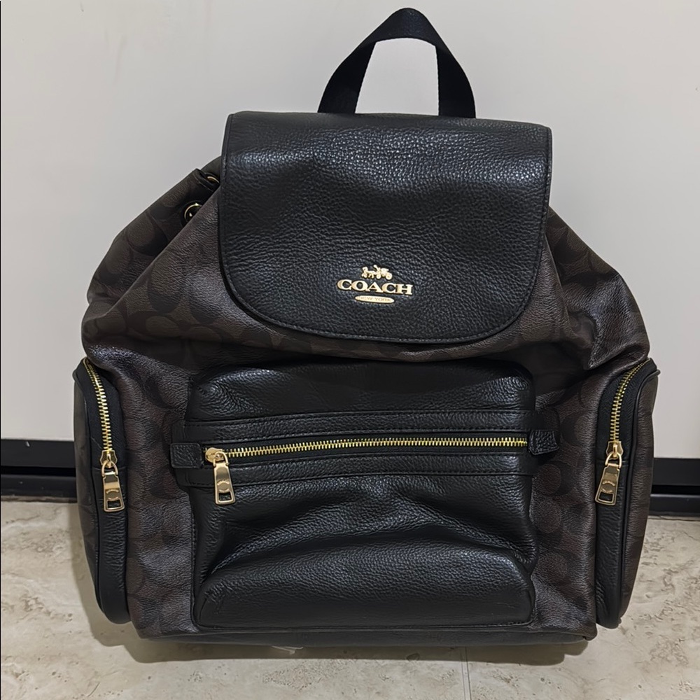 Coach Black and Brown Leather Backpack/Diaper Bag with Adjustable Straps.